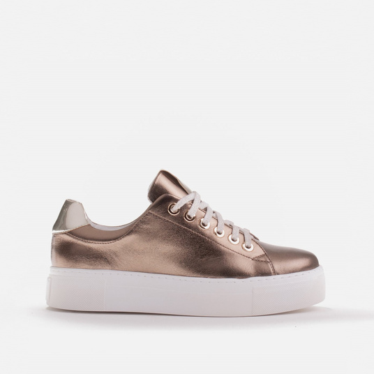 Women's sneakers made of genuine leather on a thick sole